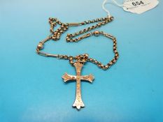 A yellow metal watch chain marked 9ct with a hallmarked 9ct gold cross (11.