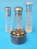 A hallmarked silver and guilloché enamel topped cut glass scent bottle,