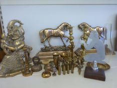 A pair of brass Punch and Judy door stops,