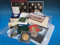 A collection of modern commemorative crowns etc together with UK proof sets 1986 and 1994,