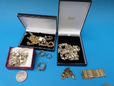 A very large hallmarked silver buckle ring, silver signet ring,