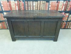An 18thC oak and elm carved chest (W128 x D53.