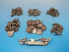 A quantity of silver watch chain pieces etc together with silver bracelets etc