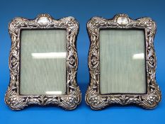 A pair of hallmarked silver photo frames to suit 6