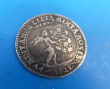 A 1625 silver medal coin to commemorate the marriage of Charles I and Henrietta Maria.