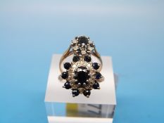 Two 9ct gold rings set with sapphires and diamonds in a cluster (size M/N)
