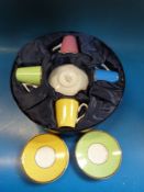 A boxed Royal Worcester harlequin coffee set celebrating The Queen's 80th birthday
