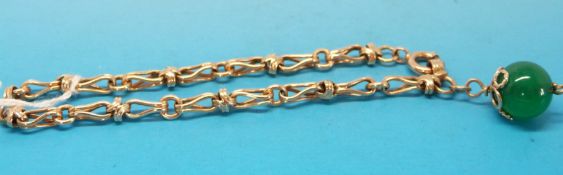 A 9ct gold bracelet with a bead charm (13.