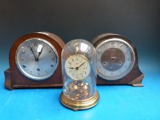 A collection of clocks including three-train examples by Smiths