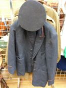 A quantity of military uniform including jackets, shirts,