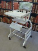 A vintage metamorphic highchair
