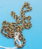 A yellow metal rope twist necklace marked 9ct (7.