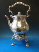 A large 19thC silver plated spirit kettle on ornate stand,