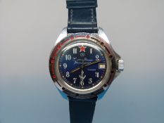 A vintage Russian Kaughqupckue submariners wristwatch with Arabic numerals on blue face with date