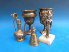 An Egyptian figure on an onyx base,