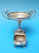 A hallmarked silver sweetmeat dish with twin scroll handles together with a silver open salt