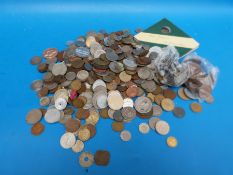 An amateur collection of overseas coinage to include some silver USA etc and Chinese examples