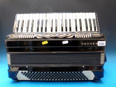 A c1960 120 bass Hohner piano accordion, two treble and two bass couplers,