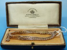 A yellow metal bracelet marked 15ct, probably Edwardian, with spare links,