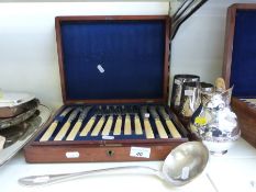 A collection of silver plate to include a large meat dish, jug, a canteen of cutlery,