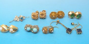 Six pairs of 9ct gold/ yellow metal earrings