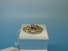 An 18ct gold ring set with two diamonds flanked by three further diamonds to each side (size N)