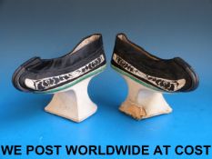 A pair of 19thC Chinese Manchu/ lotus shoes