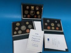 Three Royal Mint deluxe proof coin collections for 1995, 1996,
