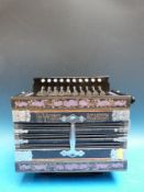 A Viceroy c1910 vintage melodeon ten tremble button, two bass buttons, two stops,