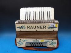 A vintage Rauner eight bass piano accordion,