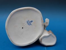 A Lladro figure of a boy with dog