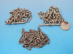 Two hallmarked silver watch chains and a white metal chain