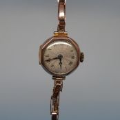 A 9ct gold ladies' wristwatch in original box