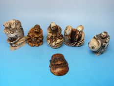 A collection of six Japanese netsukes,