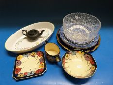 A Coalport blue and gilt plate, Doulton bowls,