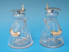 A pair of hallmarked silver mounted whisky noggins, one Birmingham 1939 the other Chester 1941,