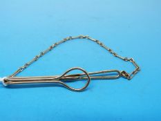 A 9ct gold tie clip and chain