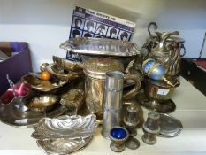 A collection of silver plated and pewter items including platters,