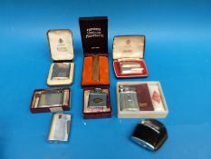 A collection of vintage Ronson lighters, mostly cased or boxed,
