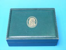 A vintage Rolex box together with a stainless steel bracelet for a Rolex Daytona, a Rolex buckle,