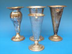 Four various white metal vases, each stamped 830 S and approximately 21cm tall,