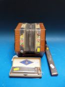 A c1970 Galotta German Anglo 20 button concertina together with a 10 hole Hohner chromatic