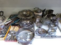 A quantity of silver plated items to include swing handled basket, cutlery, pewter tea set etc,