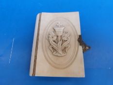 A late Victorian ivory carved prayer book