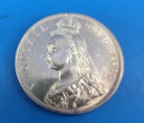 A near uncirculated 1887 Victorian Jubilee head half crown