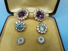 Two pairs of yellow metal earrings one pair set with aquamarines and white sapphires and the other