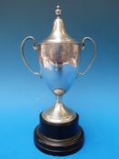 A hallmarked silver lidded trophy cup 'The Wafflers Club' London 1938, maker's mark S&Co.