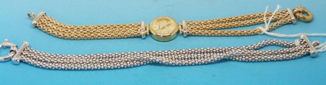 A yellow metal cased ladies wristwatch marked 9ct on a yellow metal strap marked 375 together with