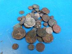 An amateur collection of ancient coins, some silver, Islamic pirate cobs, possible Celtic content,