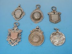 Six silver watch fobs, mostly sporting awards including RFA, darts,